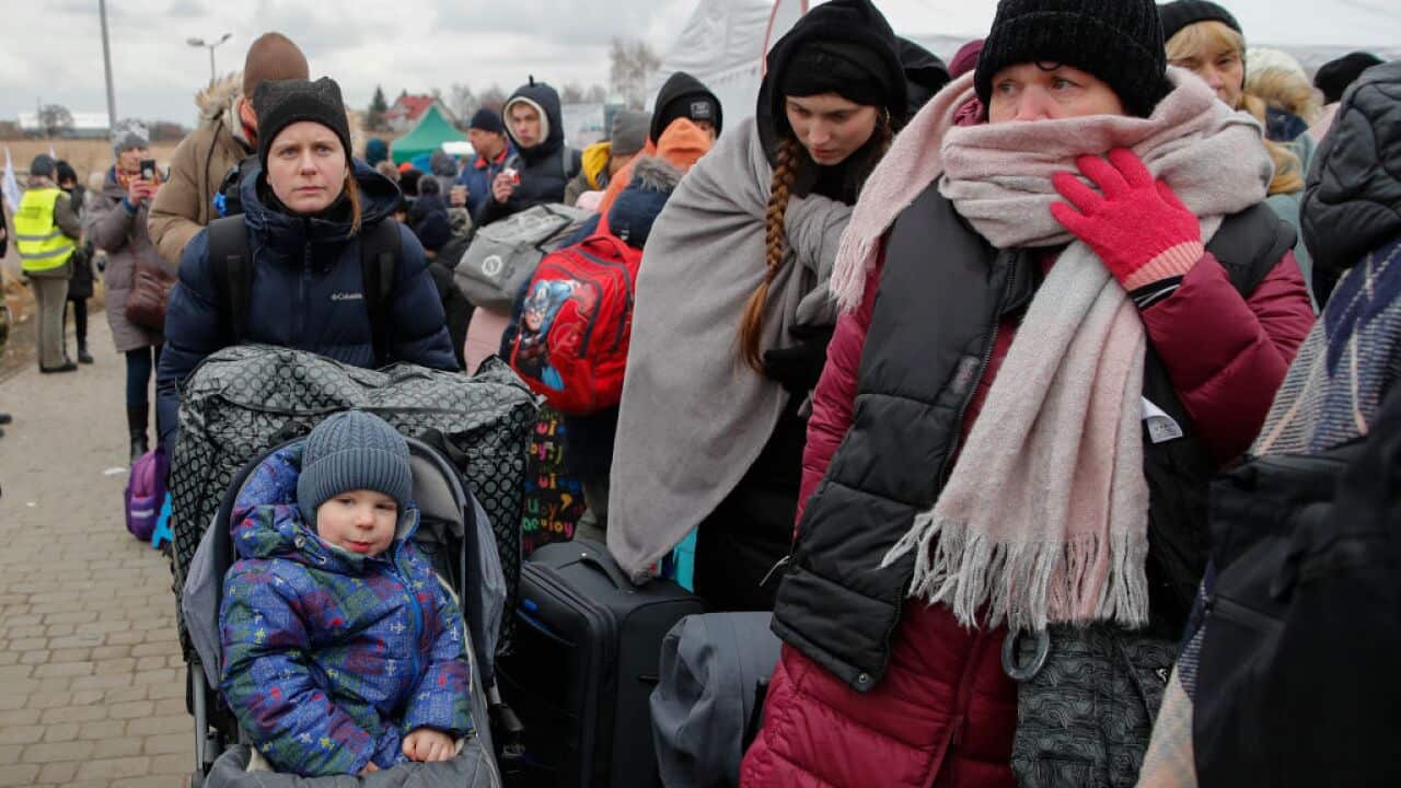 Ukrainian refugees enter Poland at the Medyca border crossing, fleeing the war unleashed by Russia which hits their territories with bombings and attacks from the ground.