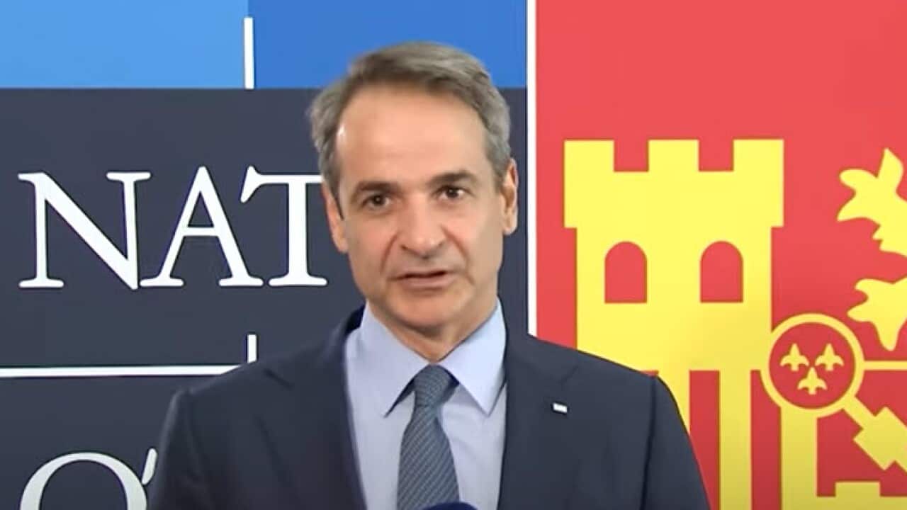 Greek Prime Minister Kiriakos Mitsotakis speaks to press after the NATO Summit