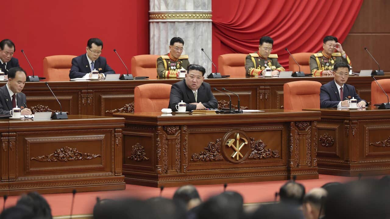 Kim Jong Un delivering a speech in a meeting