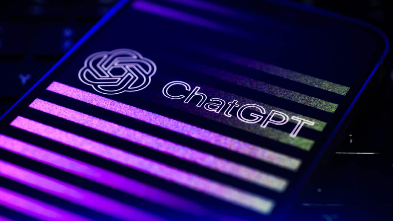 A screen with a logo on it that reads: "ChatGPT".