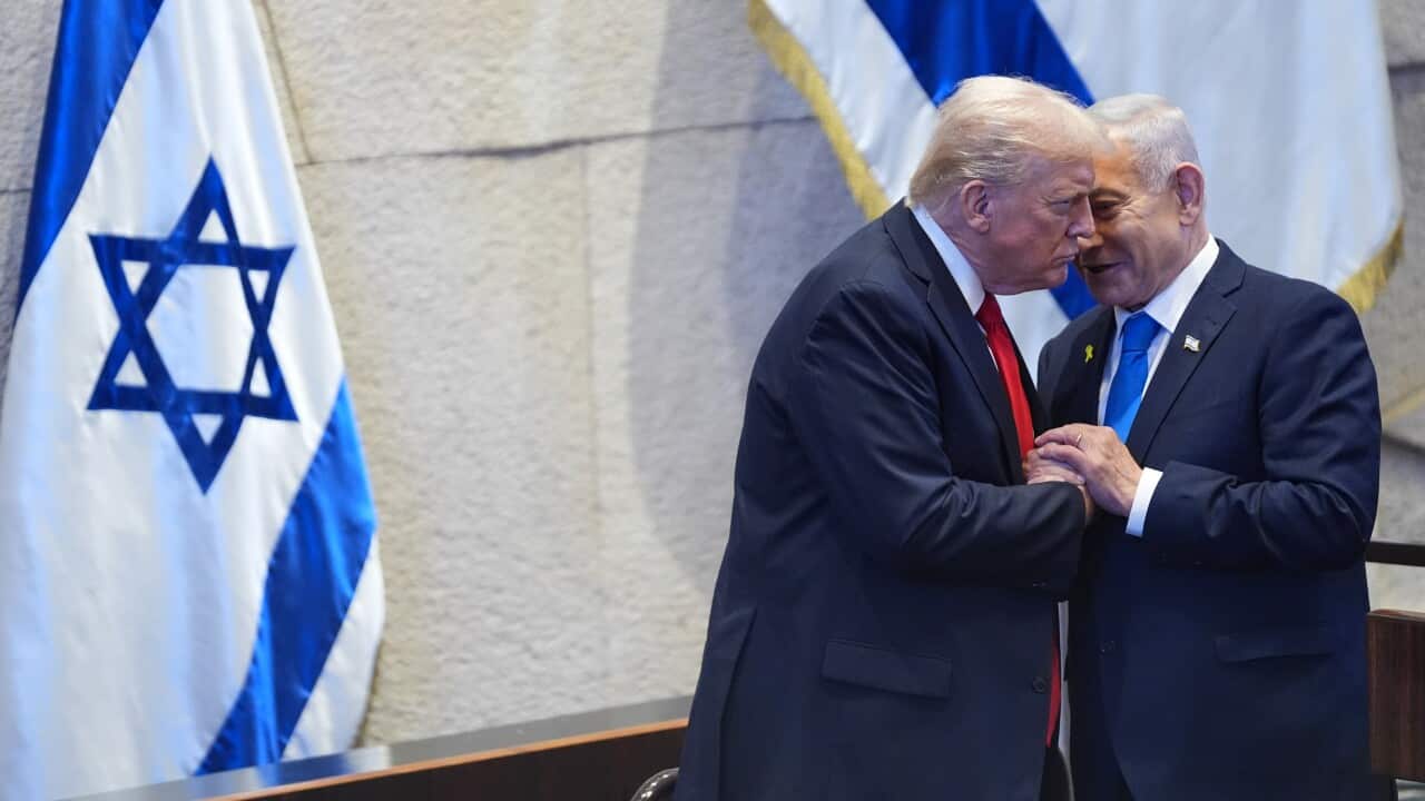 President Donald Trump talks with Israel's Prime Minister Benjamin Netanyahu at the Knesset