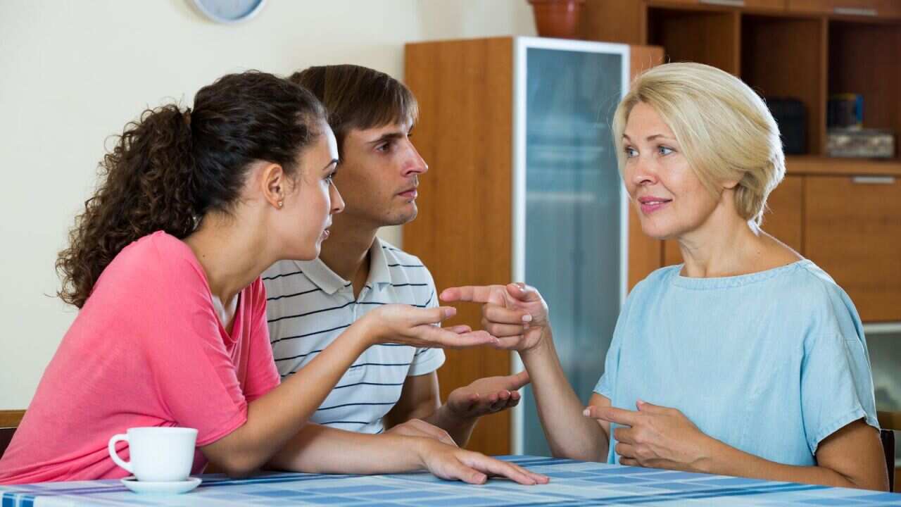 Blonde mother and two adult children