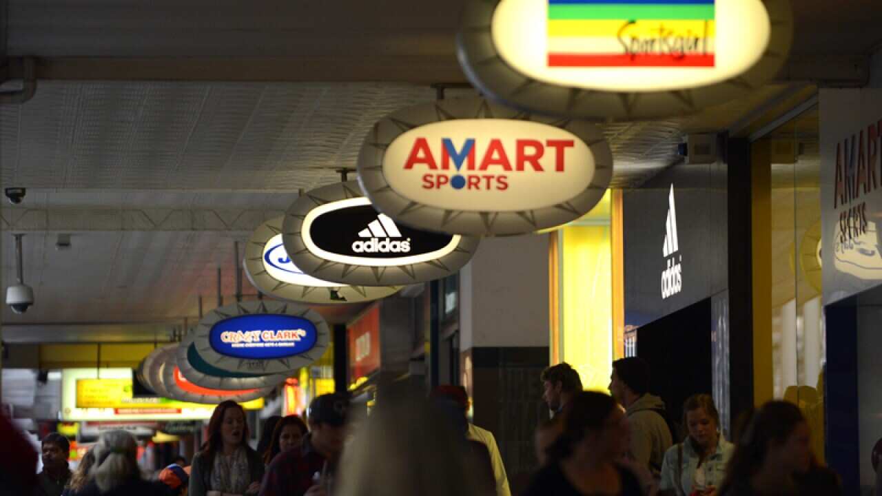 People walk through Queens Street Mall in Brisbane