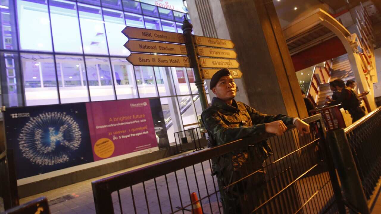 A Thai soldier stands guard