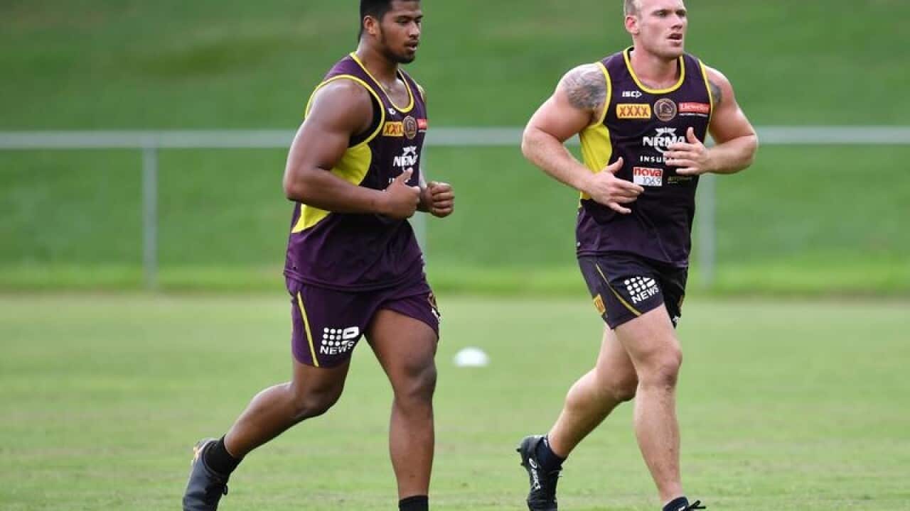 Brisbane Broncos player Payne Haas (left) and Matthew Lodge