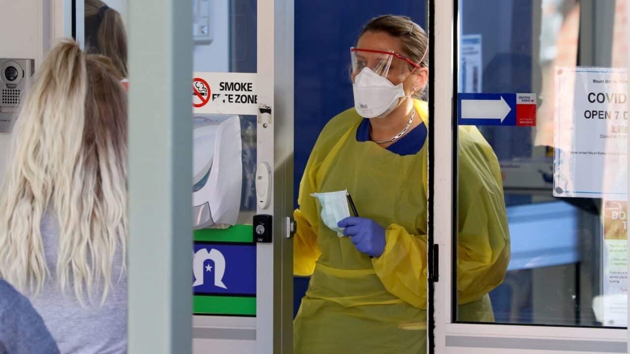 A nurse speaks with patients at the door of the new Covid-19 Clinic at the Mount Barker Hospital in Adelaide, Tuesday, 17 March, 2020.