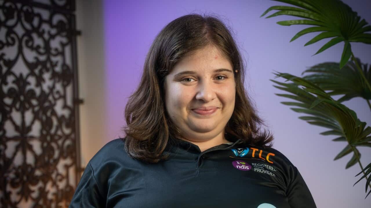 Rita Nichola, 22, at work in Sydney (SBS).jpg