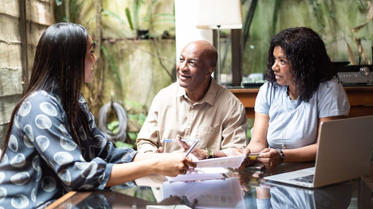 Couple with financial adviser