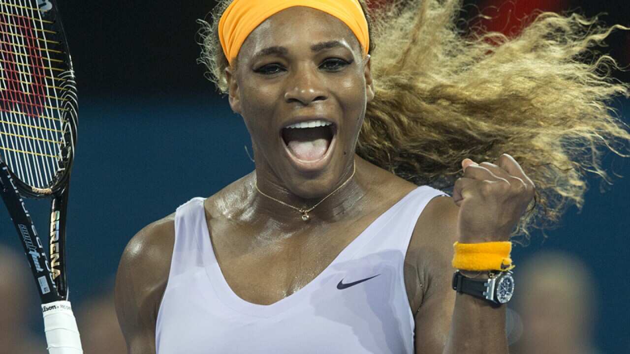 Serena Williams celebrates winning against Victoria Azarenka