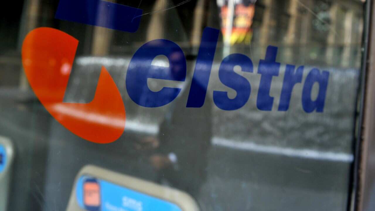 Telstra signage on a public phone booth in Martin Place, Sydney
