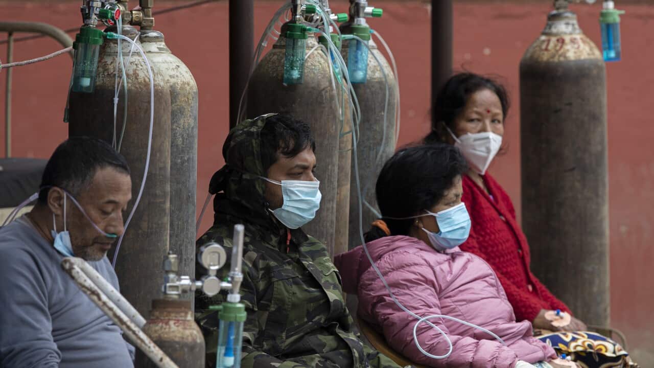 Covid-19 patients are being treated outside a hospital after Covid-19 wards are fully occupied at hospitals in Kathmandu, Nepal, 09 May 2021