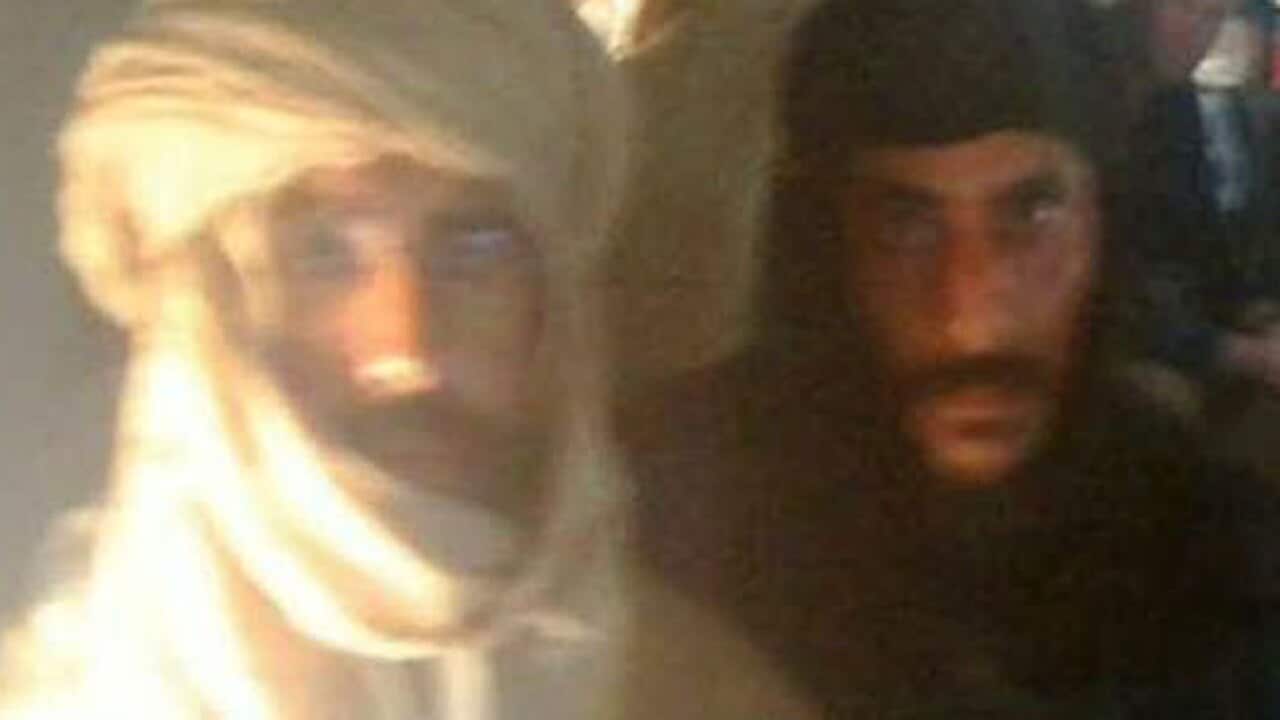 gaddafison_captured2_111120_B_aap_1341836698