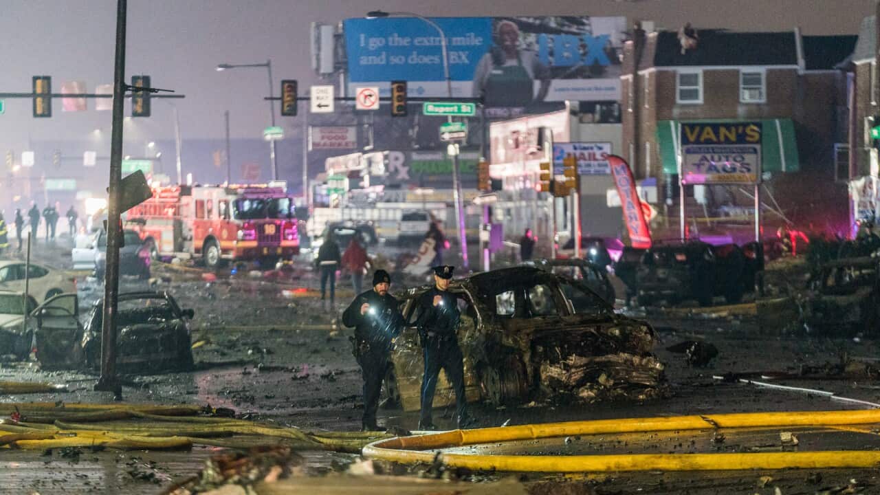 A view of the wreckage from a small plane after it crashed in a residential area in the US city of Philadelphia