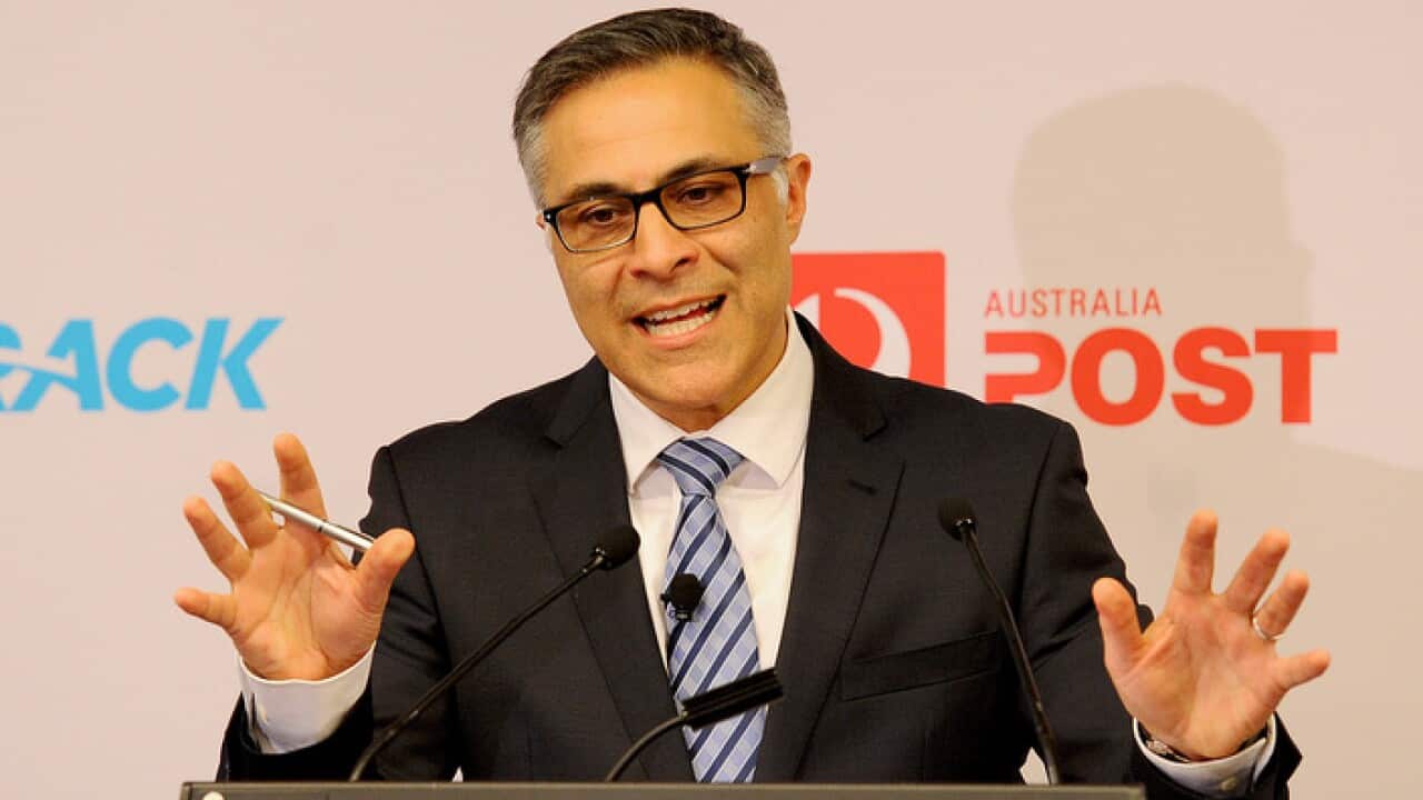 Australia Post Managing Director and Group CEO Ahmed Fahour announces Australia Post's full year financial year results in Melbourne, Thursday Sept. 4, 2014. (AAP Image/Joe Castro) NO ARCHIVING