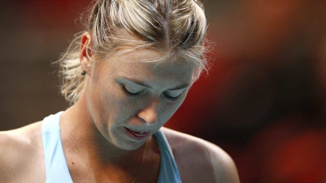 Maria Sharapova reacting during a match