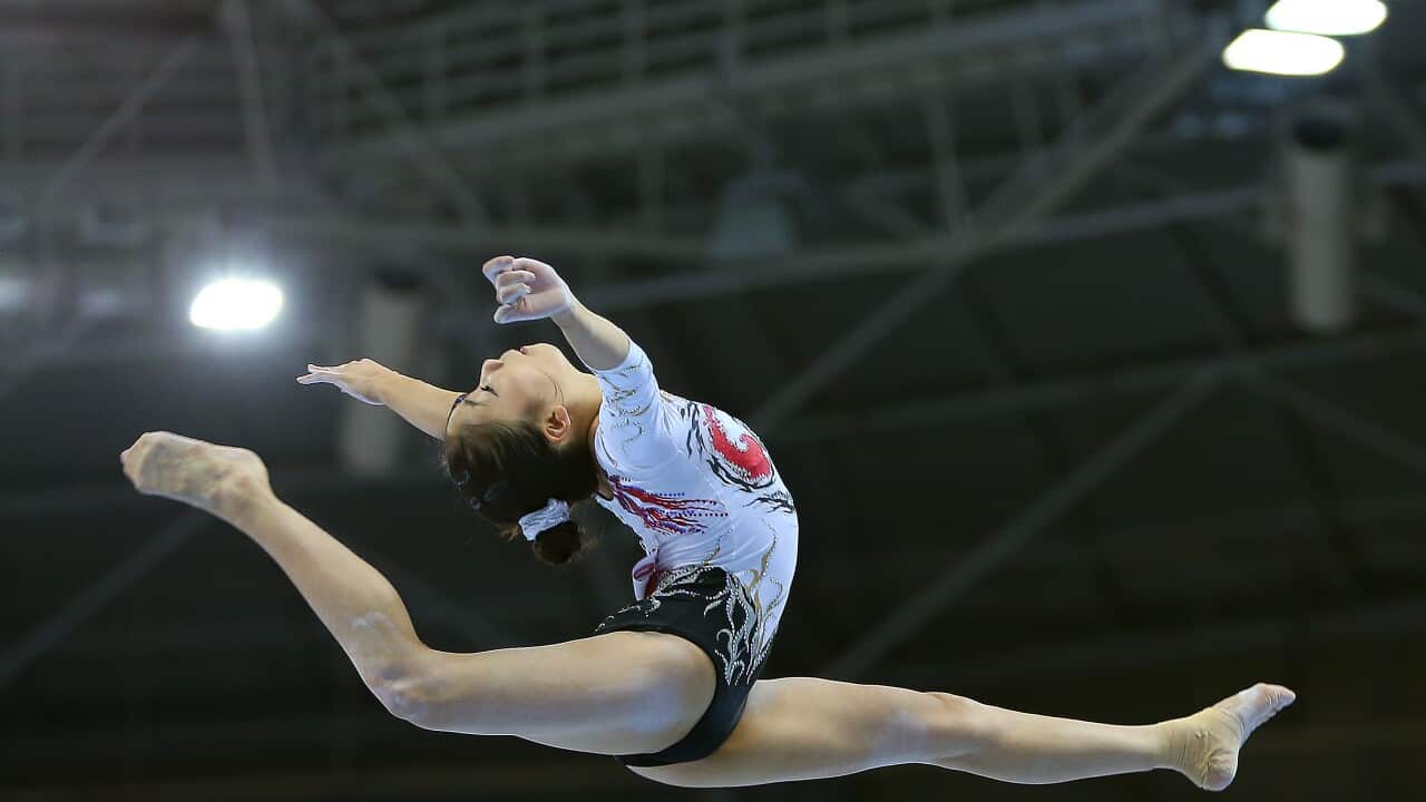 South Korea's Chung Hee-yeon performs in the women's gymnastics team event of the Asian Games at Namdong Gymnasium in Incheon on Sept. 22, 2014. (AAP Image/Yonhap News Agency) NO ARCHIVING, AUSTRALIA ONLY