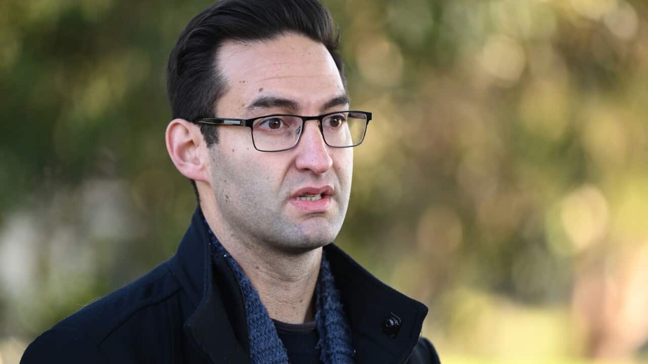 A man talking outside