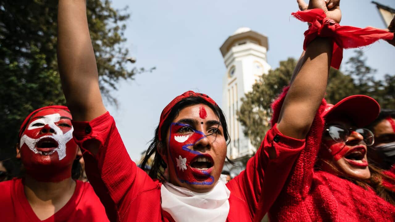 Supporters of the Nepal Communist Party attend a celebration rally one day after the Supreme Court ordered the reinstatement of Parliament after being dissolved by the prime minister