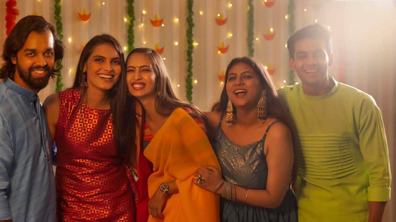Friends celebrating Diwali together at home