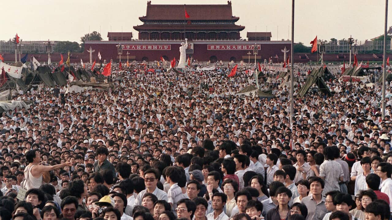 On June 2, 1989, hundreds of thousands of Chinese gathered around a 10m replica of the Statue of Liberty (C) in Tiananmen Square demanding democracy despite martial law in Beijing. (CATHERINE HENRIETTE/AFP/Getty Images)