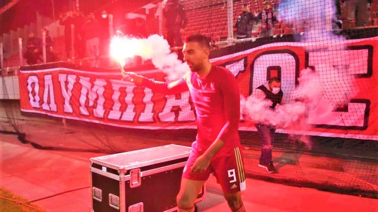 Ahmed Hassan scored a brace to lead Olympiakos to a title-winning victory over Panathinaikos.