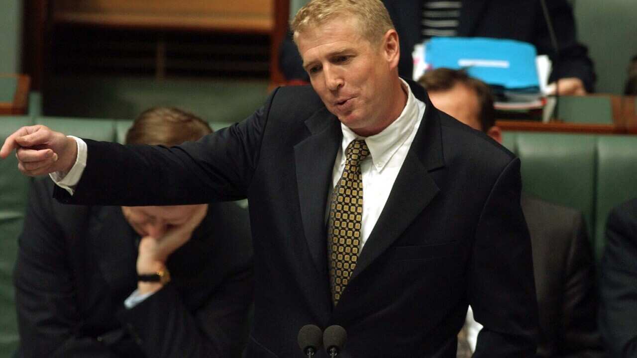Canberra, August 19, 2003. Children and Youth Affairs Minister Larry Anthony during Question time in the House of Representatives chamber at Parliament House Canberra today.(AAP Image/Alan Porritt) NO ARCHIVING