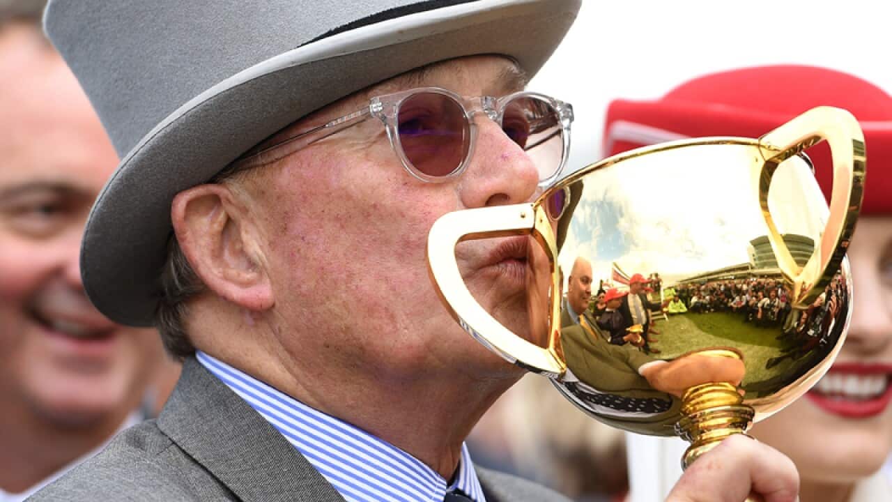 Almandin owner Lloyd Williams kisses the Melbourne Cup
