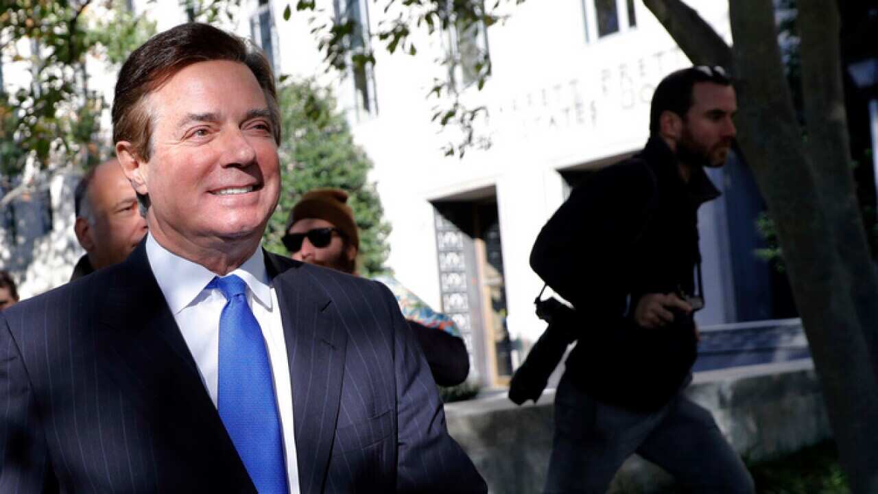 Paul Manafort leaves court in Washington (AAP)