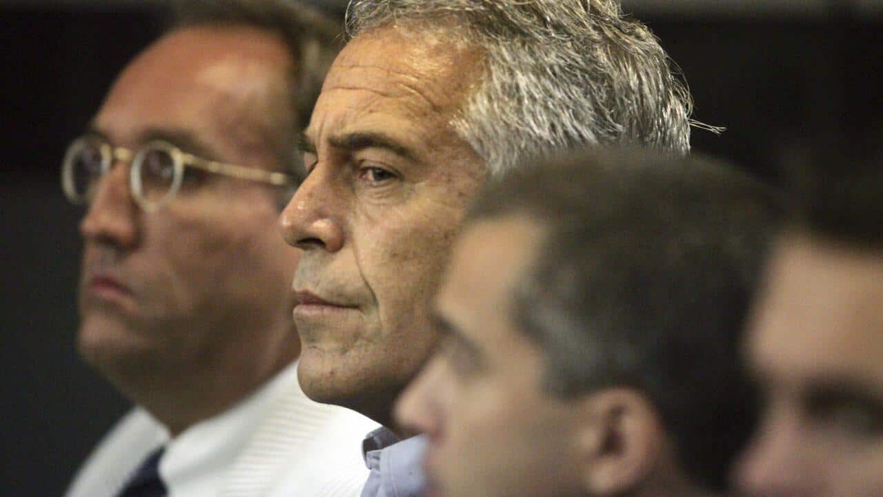 Jeffrey Epstein (center) is shown in a Palm Beach County courtroom on July 30, 2008
