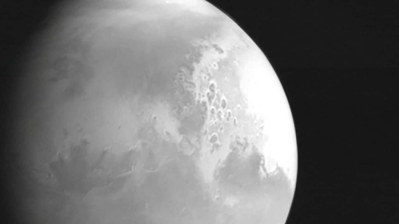 The black and white photo of Mars was taken by China's Tianwen-1 probe about 2.2 million kilometres from the red planet.