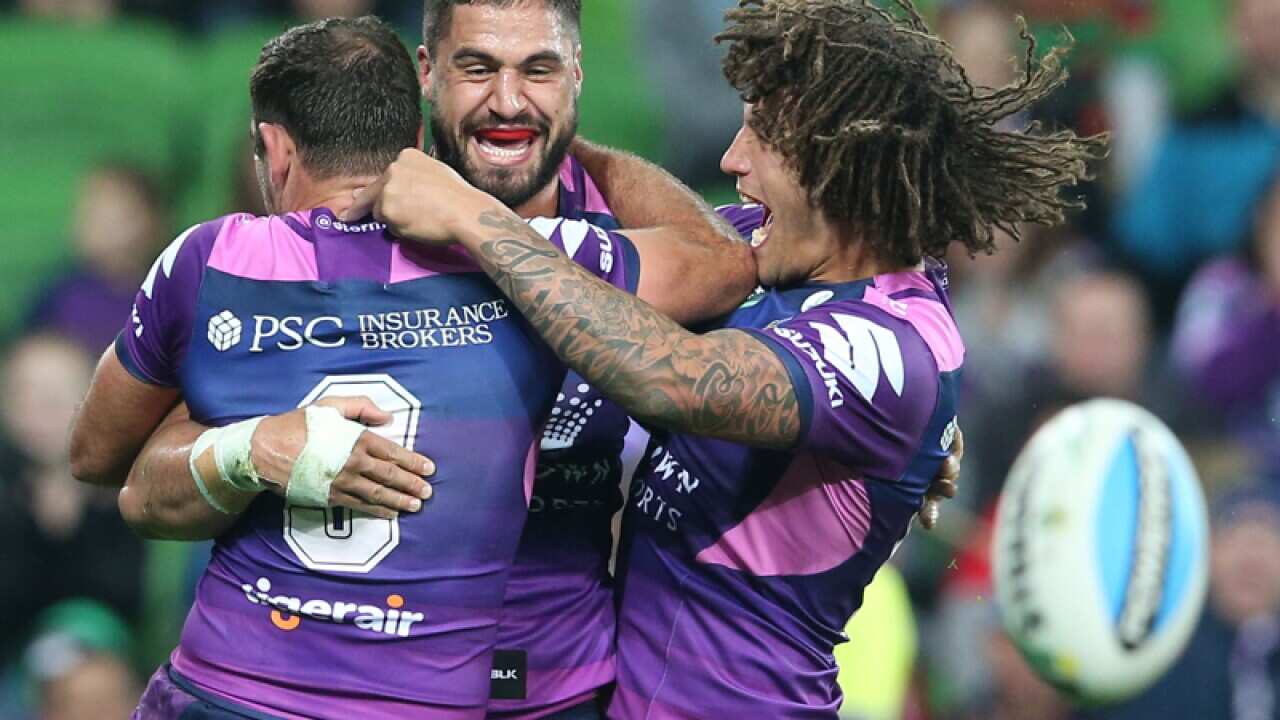 Jesse Bromwich after scoring a try for the Storm