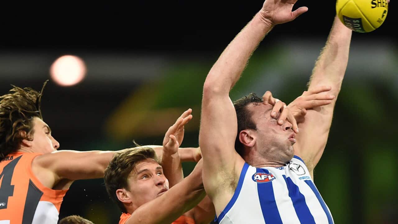 Todd Goldstein of the Kangaroos and the Giants Rory Lobb