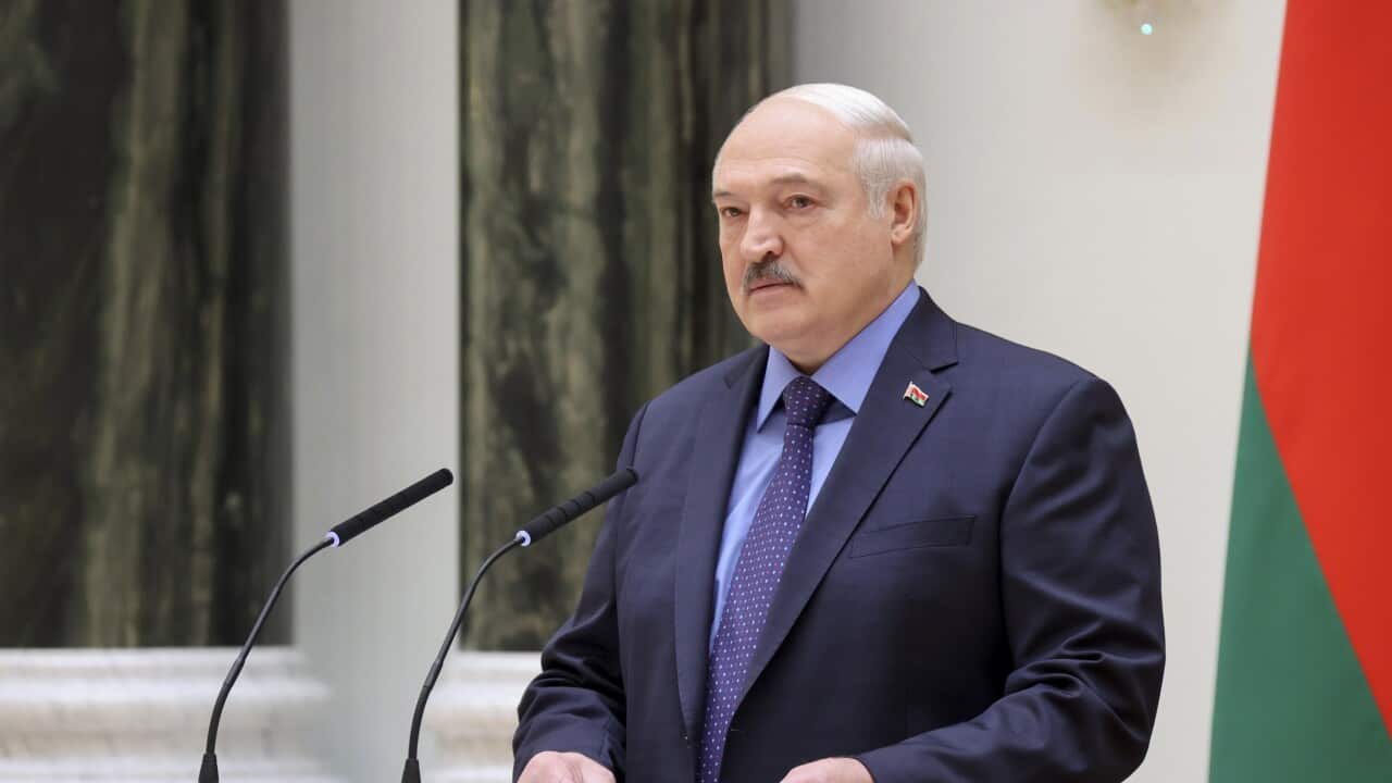 Belarusian President Lukashenko speaking at a podium.