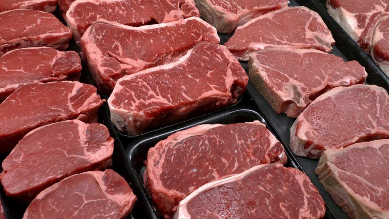 Steaks and beef products on display in a grocery store