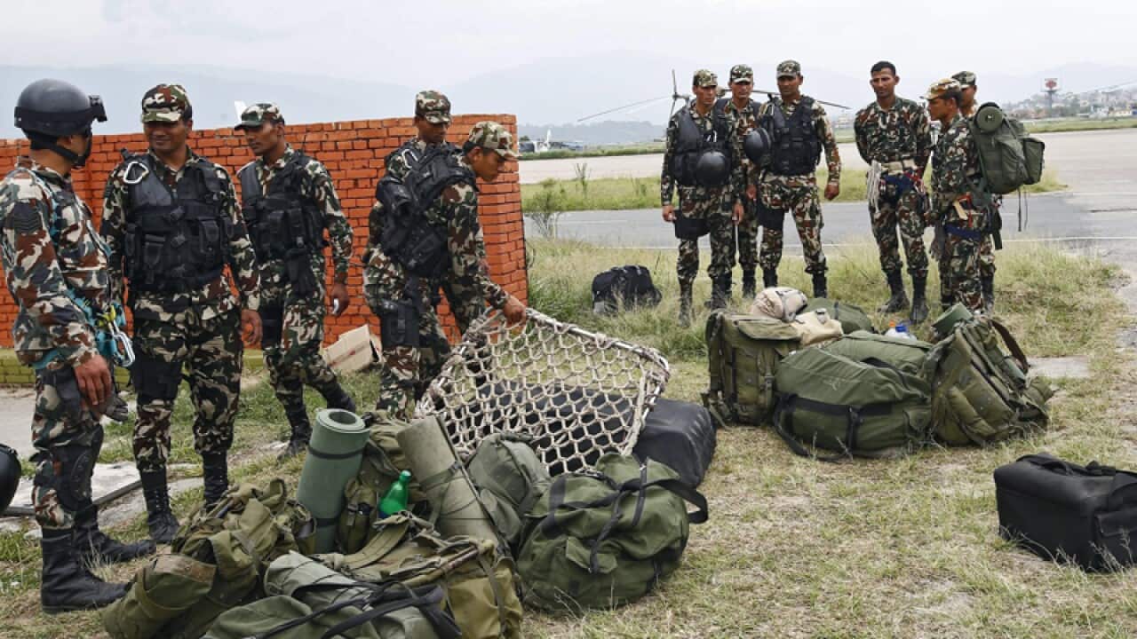 Nepal Army special force search for debris of a US helicopter