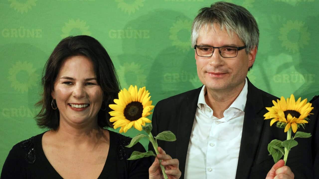 German Greens party Co-ChairwomanAnnalena Baerbock and top candidate of German Greens party for the European Parliament elections, Sven Giegold.