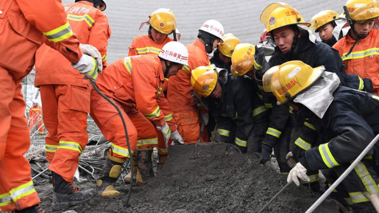 Chinese rescuers at the accident site at the Fengcheng power plant