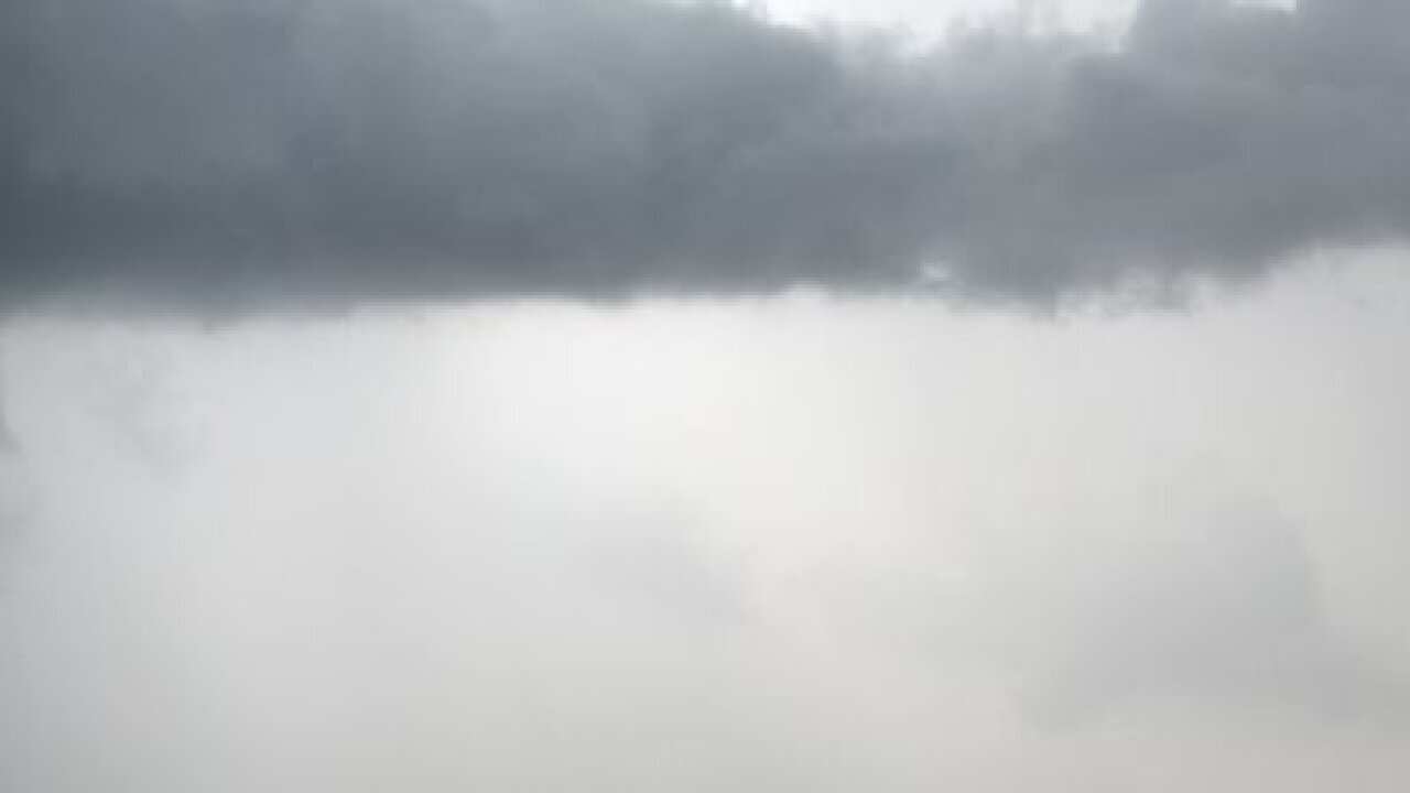 Storm clouds are seen gathering over Sydney.