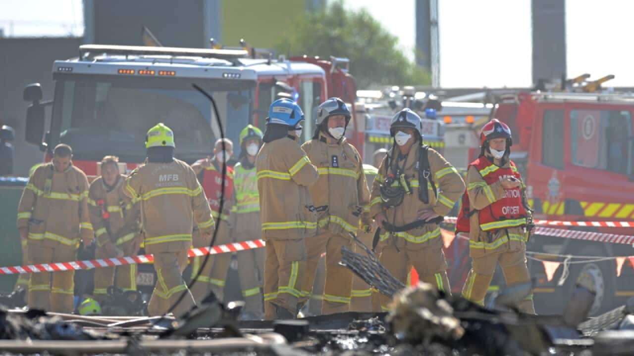 Emergency services at the scene of a fatal plane crash in Melbourne