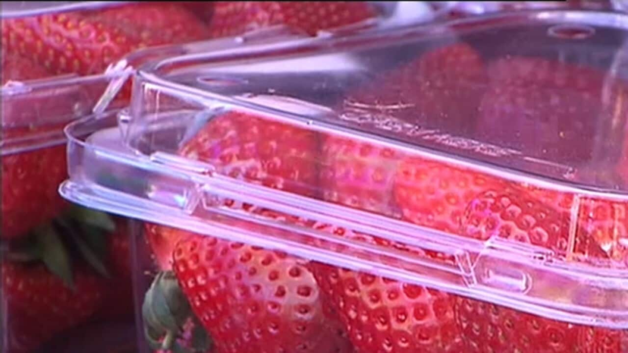 A punnet of strawberries.