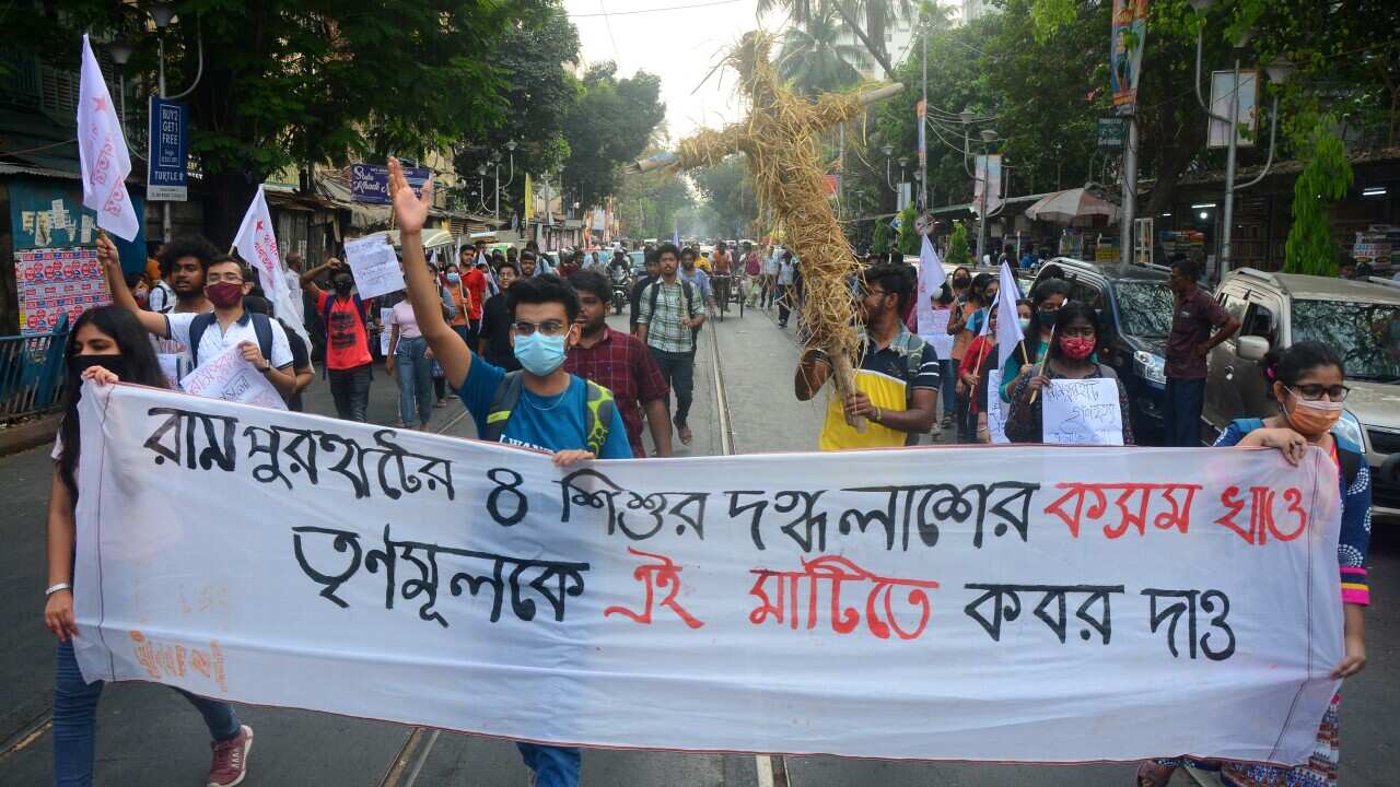Students activists protest againstRampurhat incident where eight people including two children were charred to deathby fire.