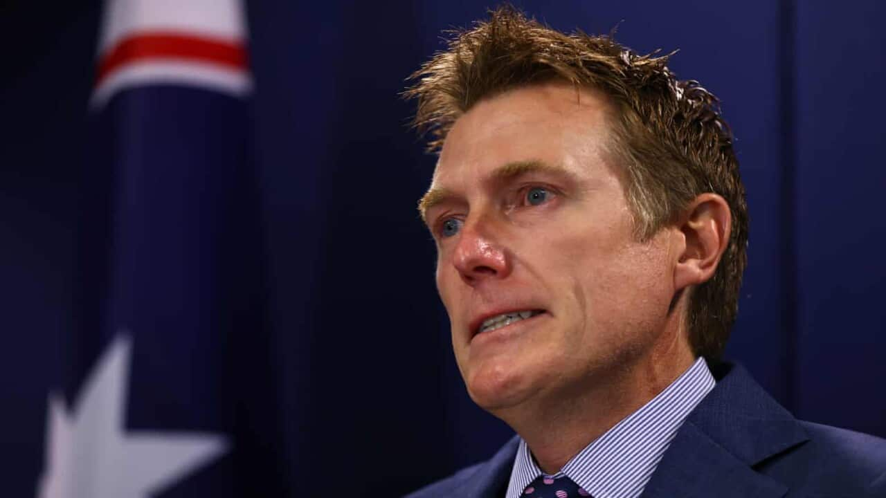 Christian Porter holds back tears during a press conference in Perth. He self-identified as the Minister at the centre of historial rape allegations, he denies.