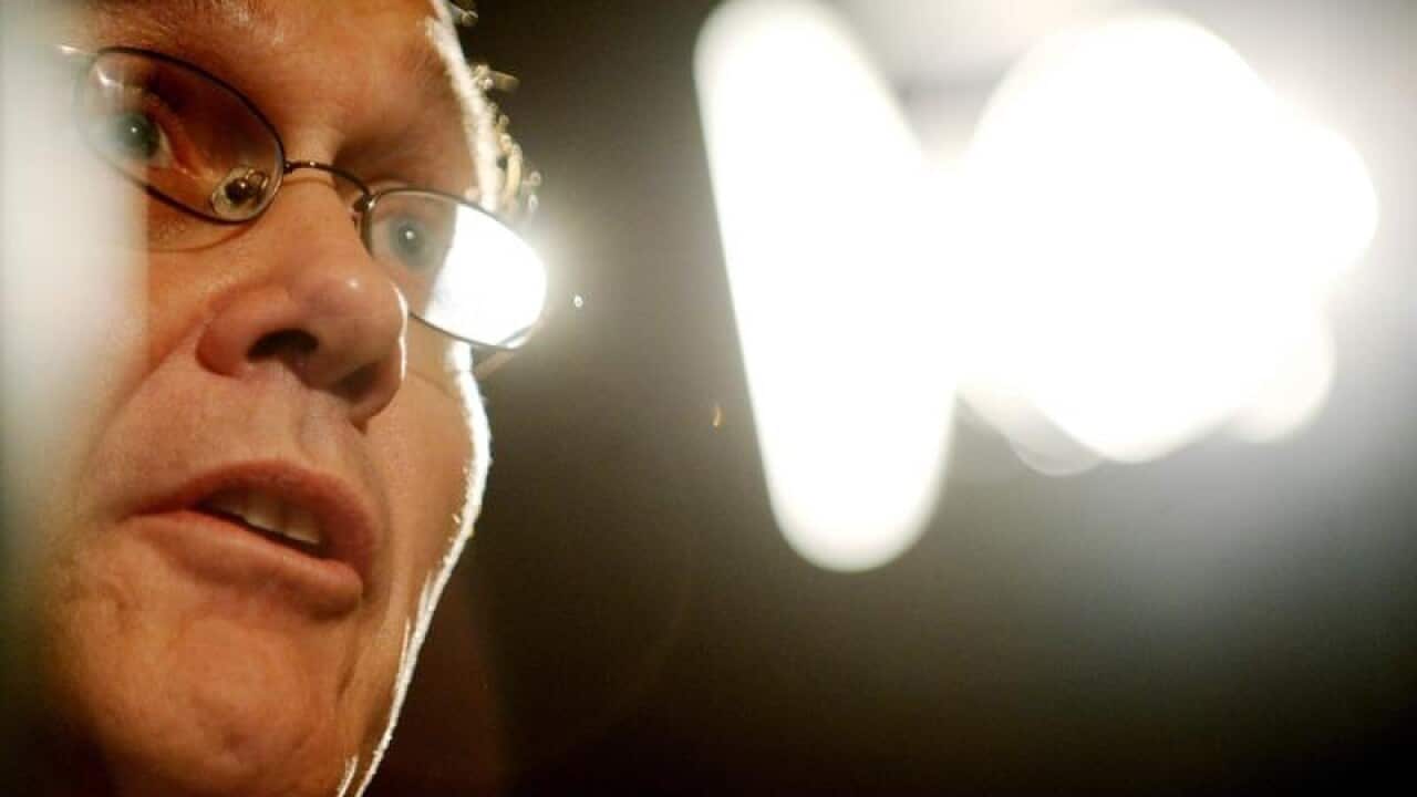 Aristocrat Leisure's Simon Kelly looks on