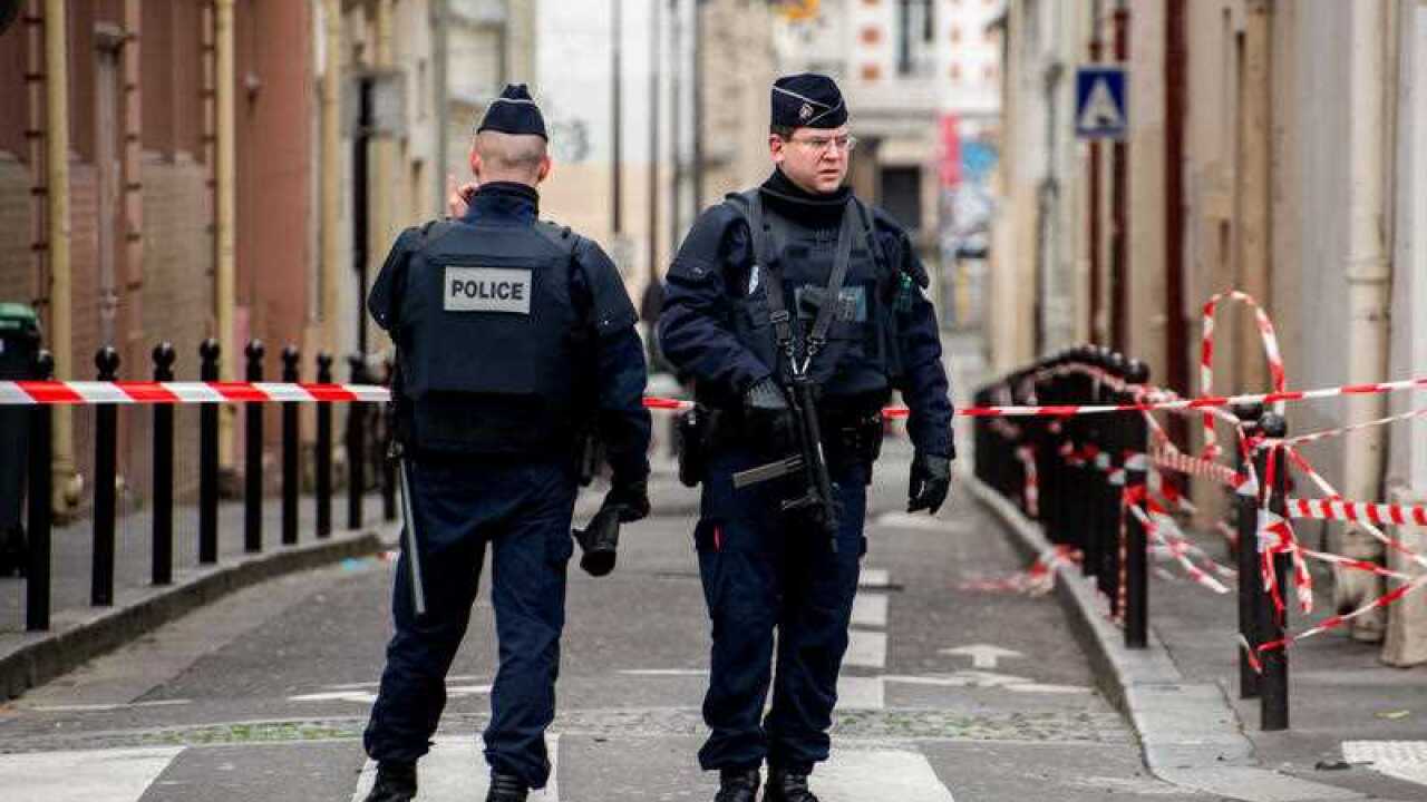 French police officers parol near Le Bataclan concert hall, in Paris