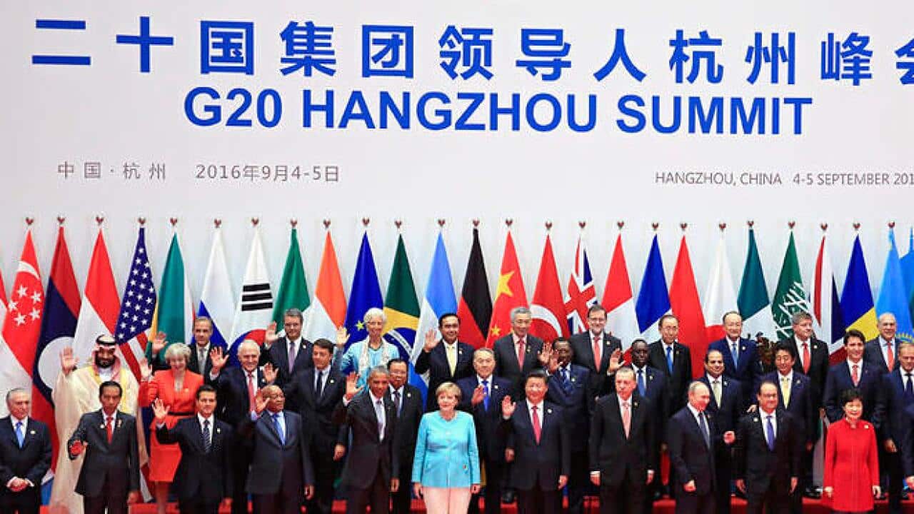 Leaders pose for a family photo during the G20 Summit in Hangzhou,