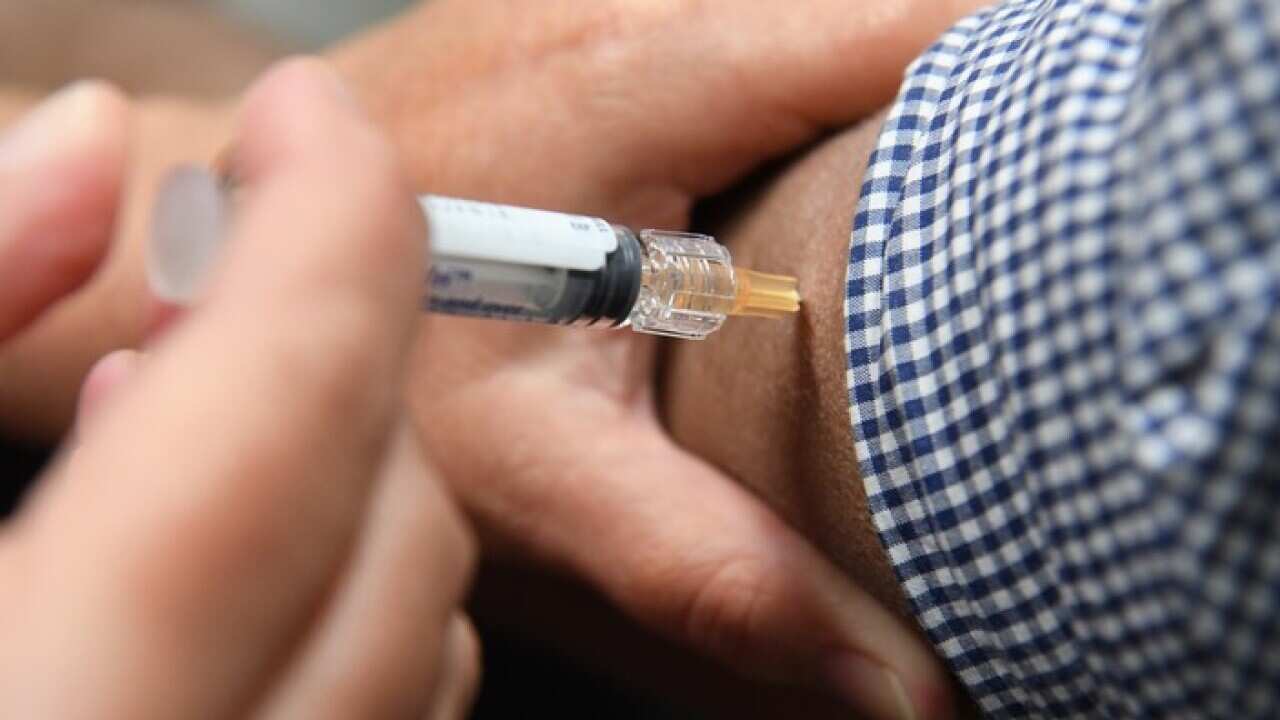 Getting the flu vaccination still advised