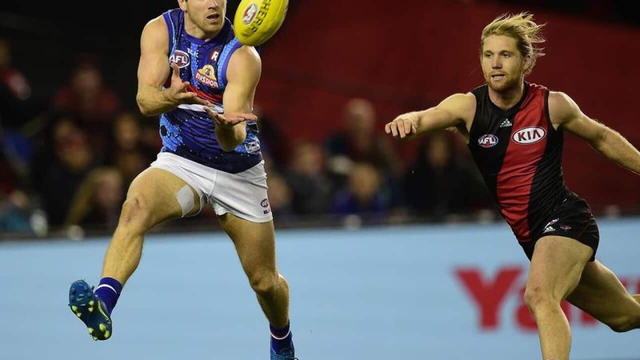 Stewart Crameri marks the ball