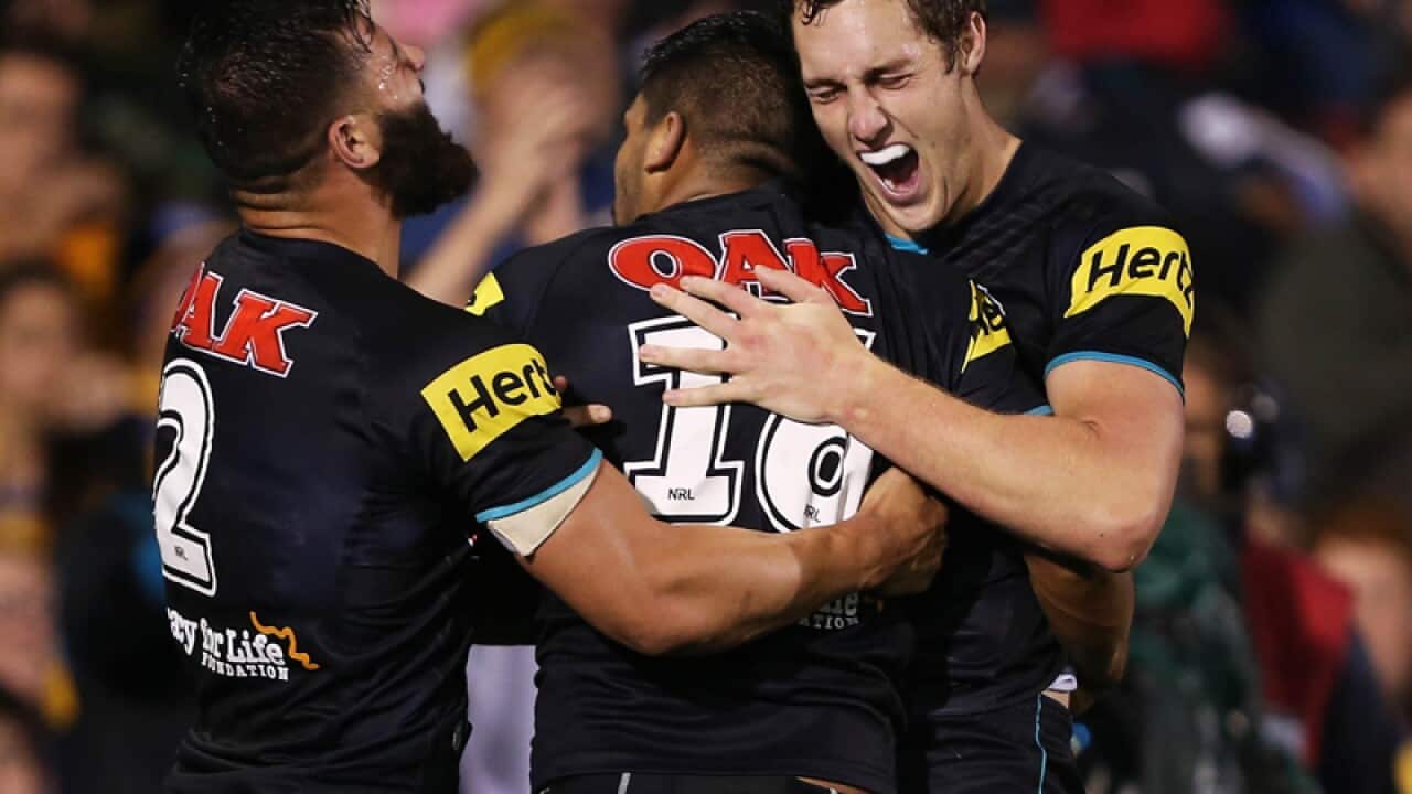 Bryce Cartwright and Josh Mansour celebrate with Tyrone Peachey