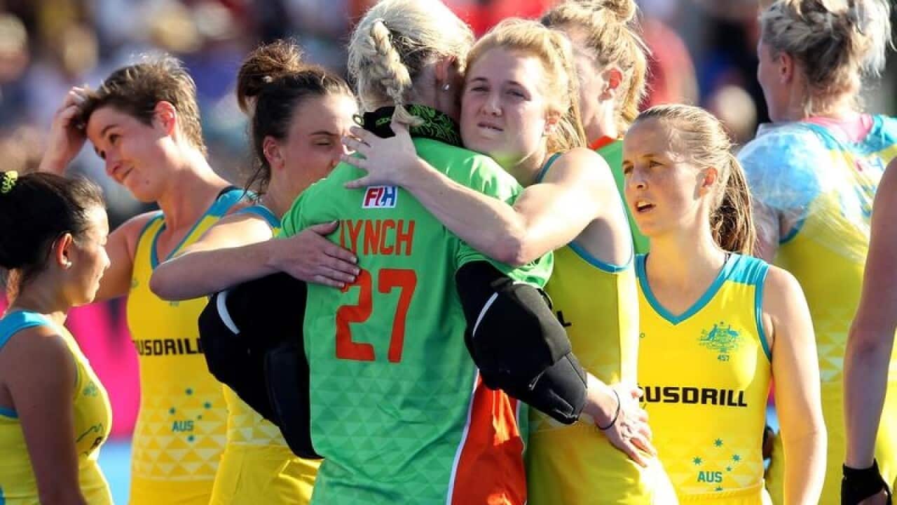 Hockeyroos console each other after the World Cup semi-final