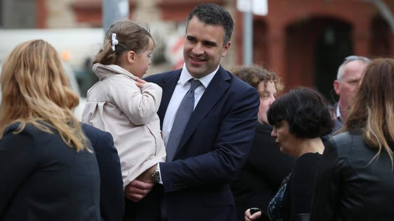File image of Peter Malinauskas with his daughter.